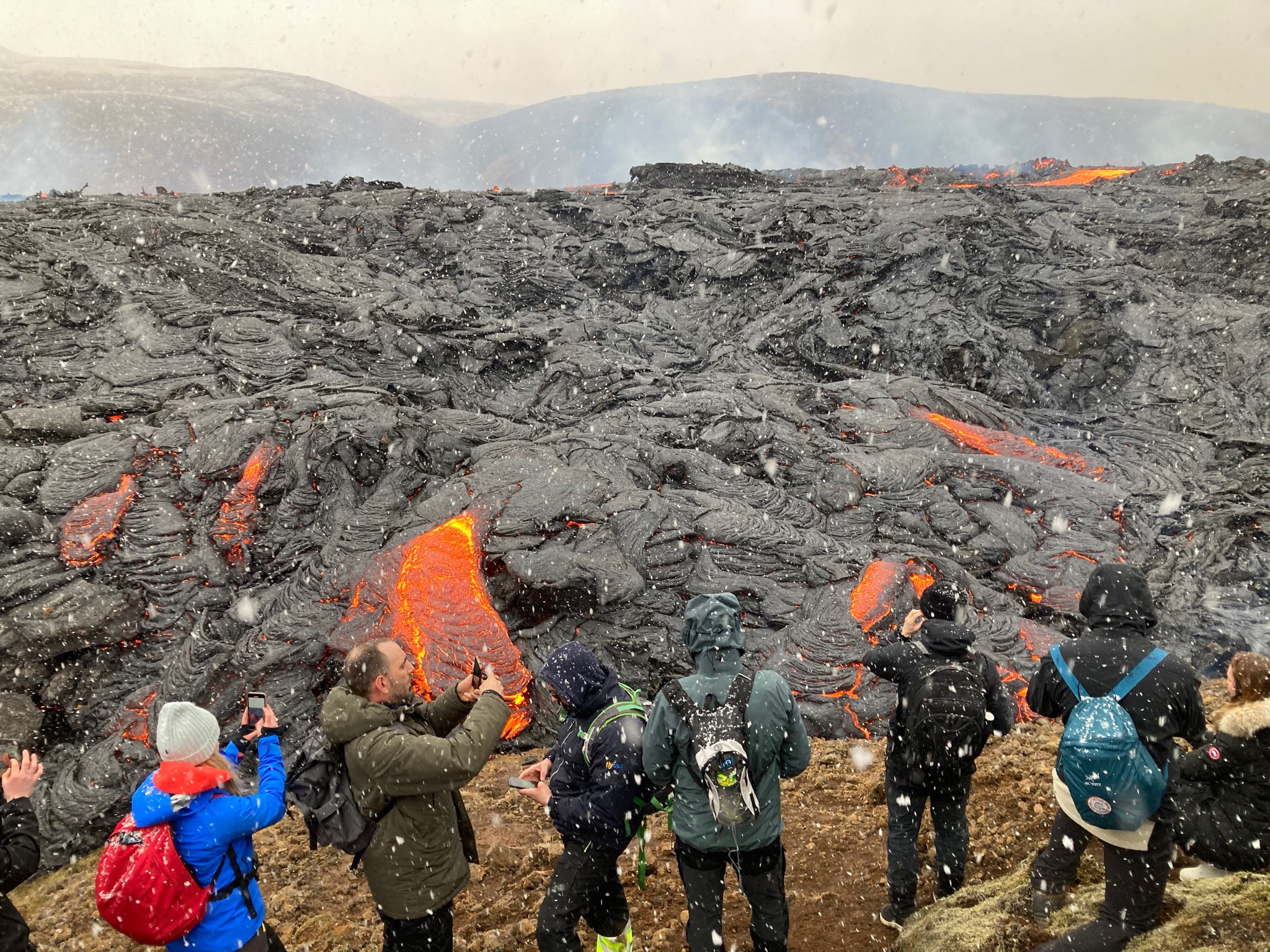 Locals flock to the active eruption.