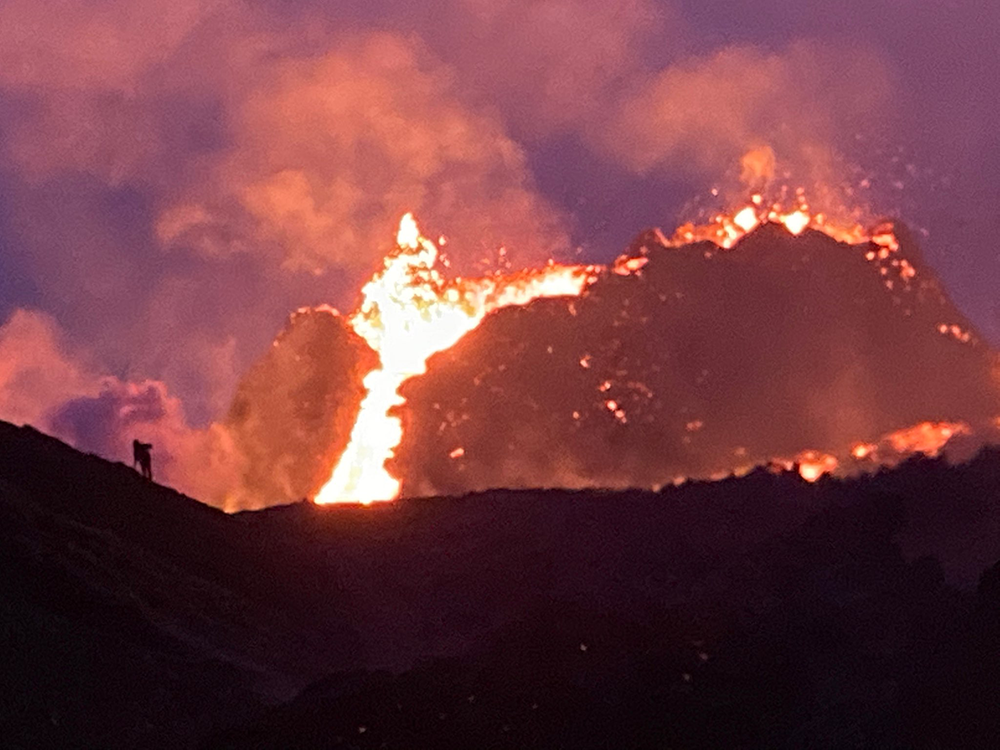 Nightime glow of lava.